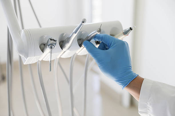 Professional Tooth Extraction technician working in St. Robert, MO